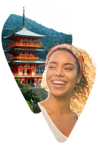 travel-designer-in-Japan Happy woman looking at a picture of a Japanese temple