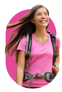 Smiling woman wearing pink shirt and hiking pack