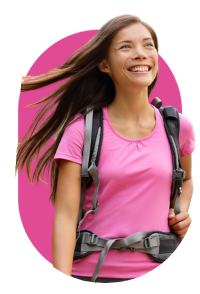 female-traveller-looking-foward Smiling woman wearing pink shirt and hiking pack