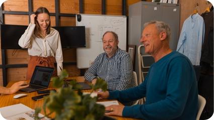 Colleagues smiling and working together