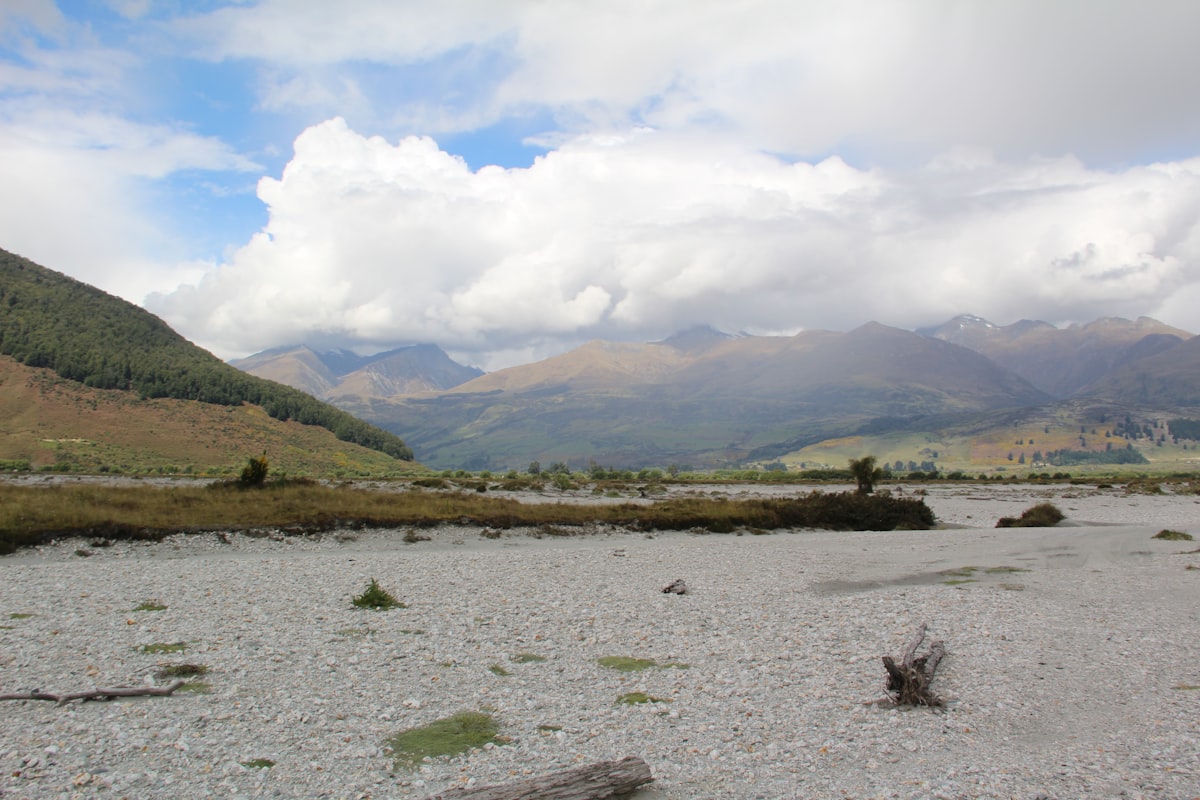 Green valley and mountains near Glenorchy, the kind of South Island scenery The Greenspot builds trips around